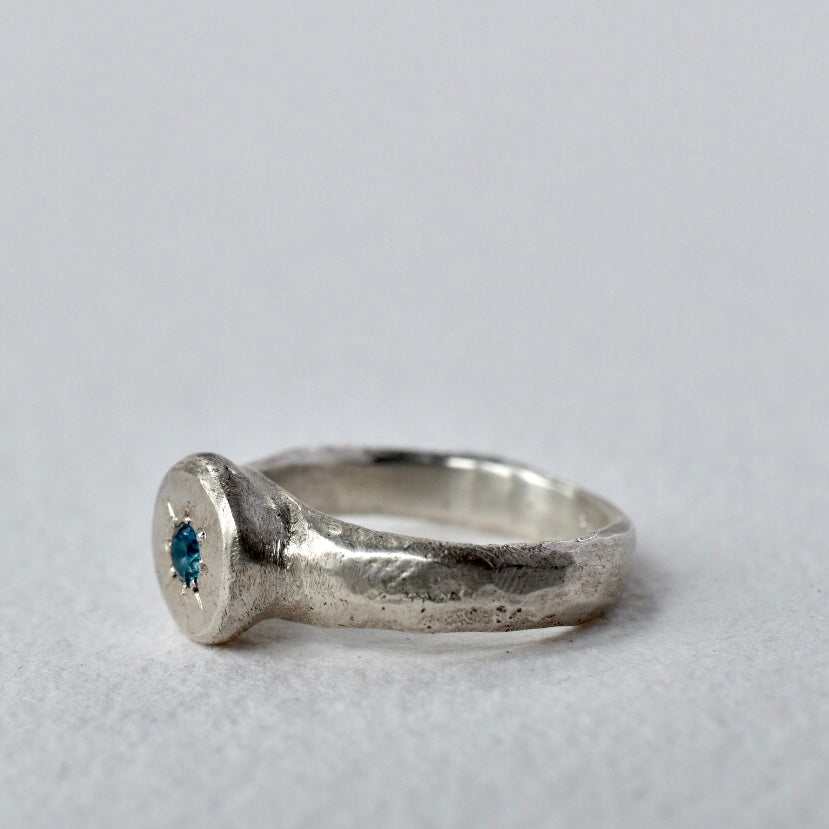 Sand cast Silver Ring with Blue Topaz - Paisley Pins